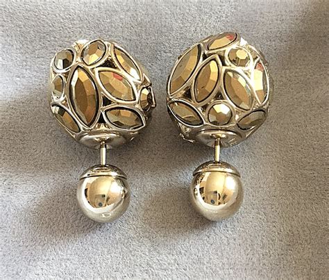 how to spot fake dior tribal earrings|christian dior tribal earrings price.